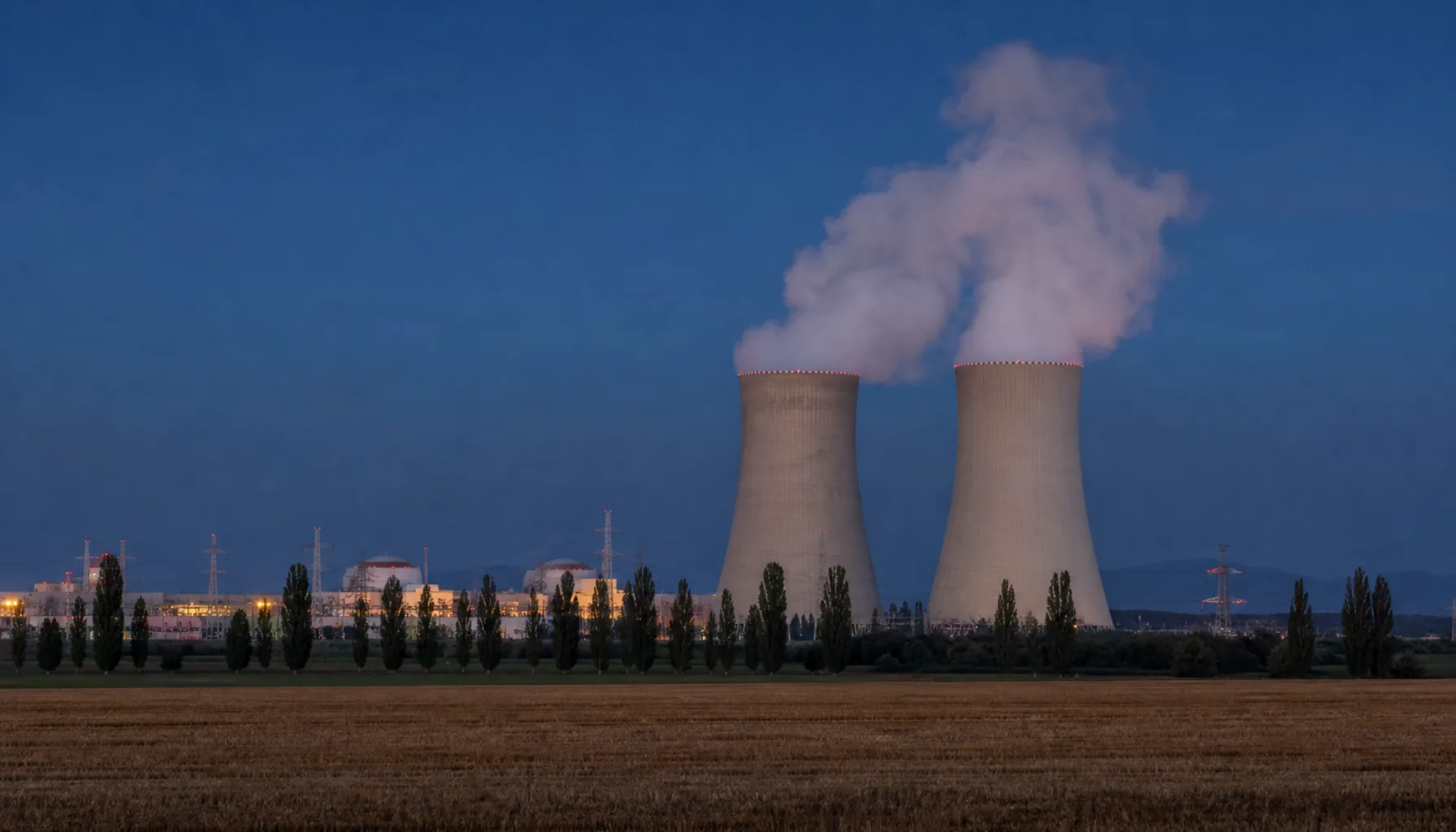 Cooling towers of the Mochovce nuclear station on the lowland horizon