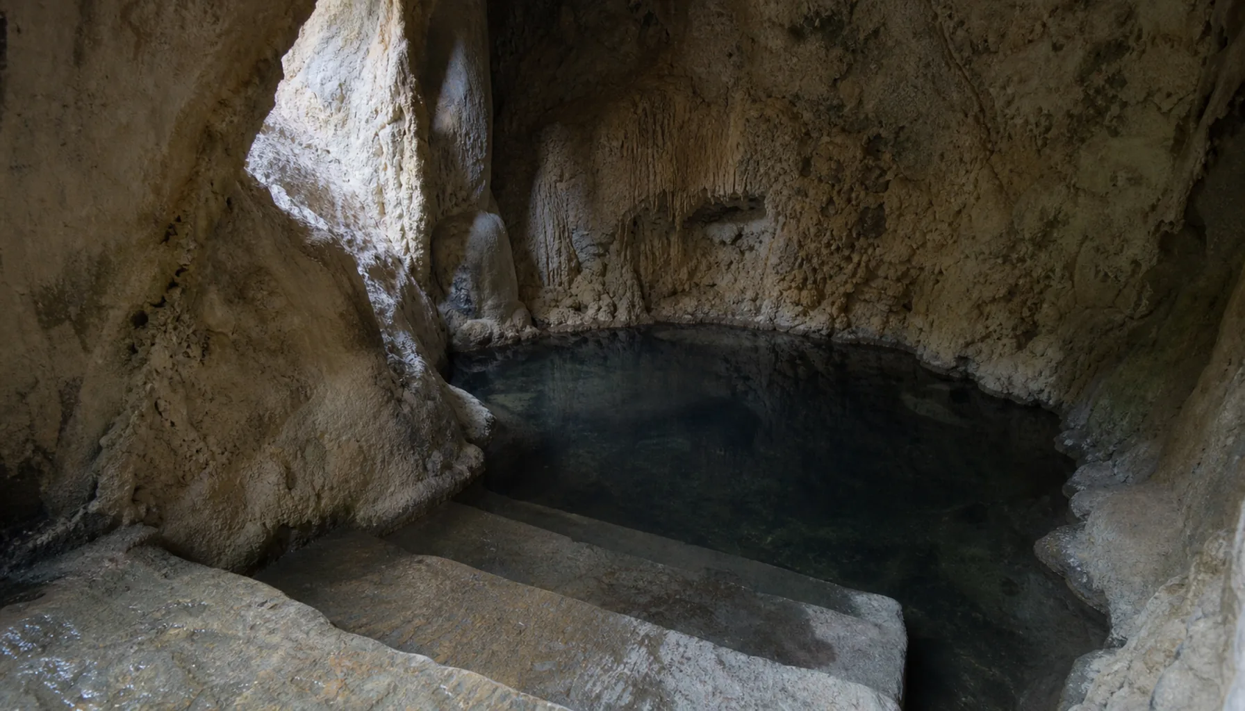 The travertine cave beneath the courtyard — reached from inside the castle, and part of the visit