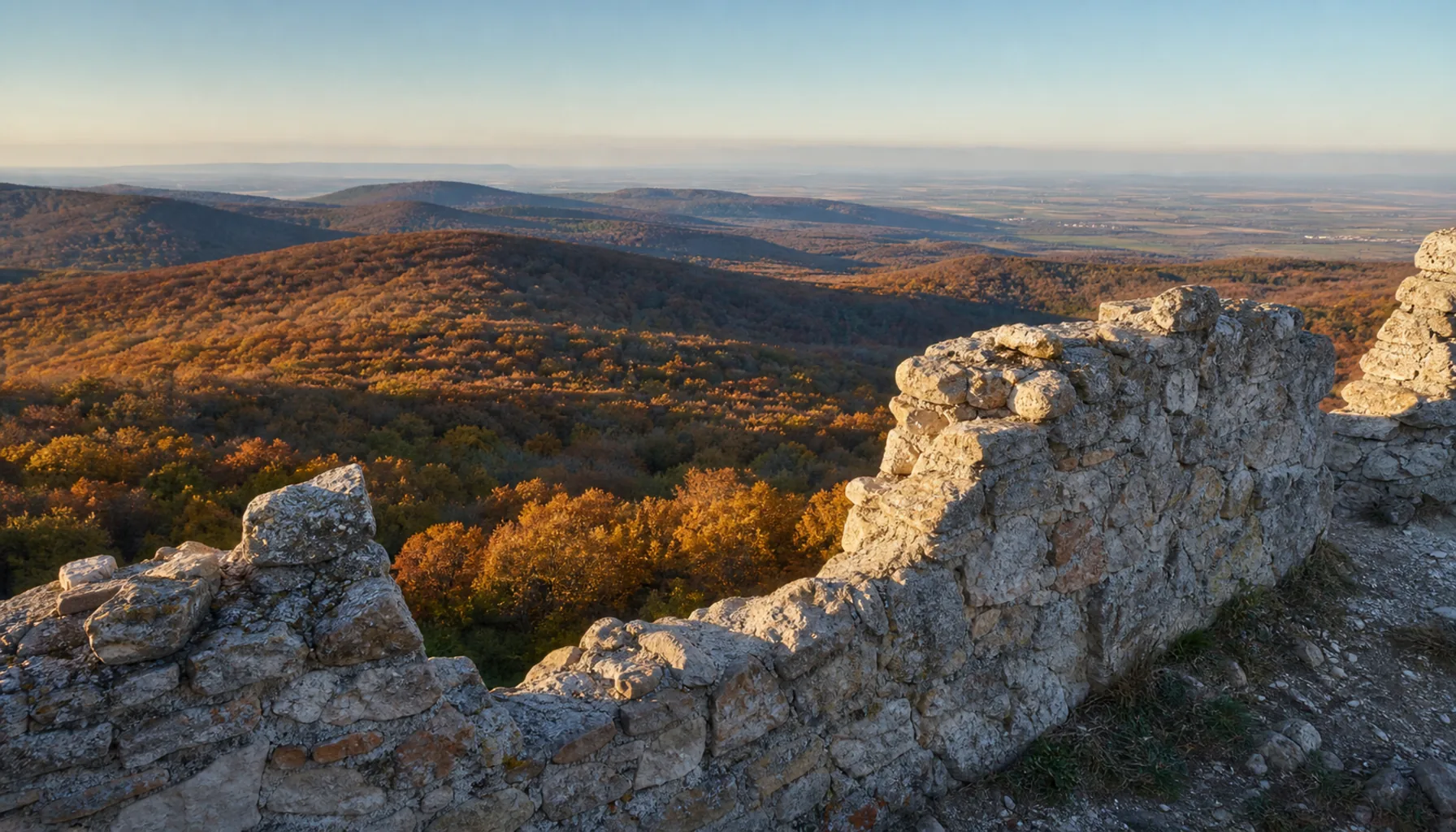 From the walls, the wooded ridges of the Tribeč roll away in every direction