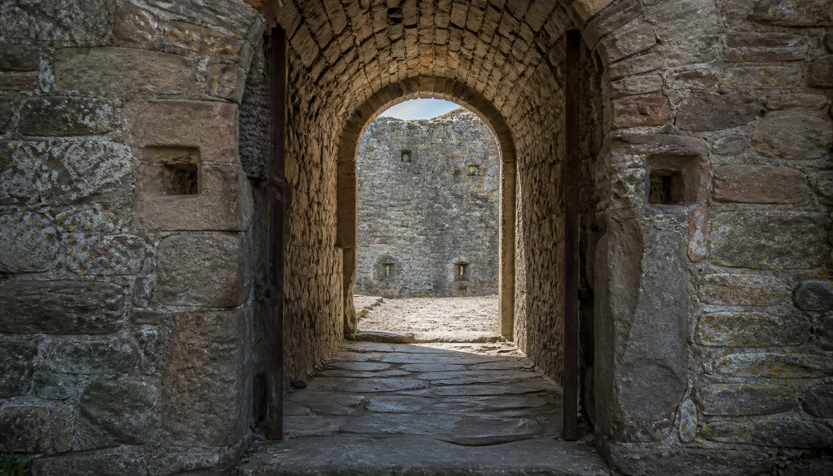 The gate passage into the castle — the way petitioners, carters and soldiers all came in