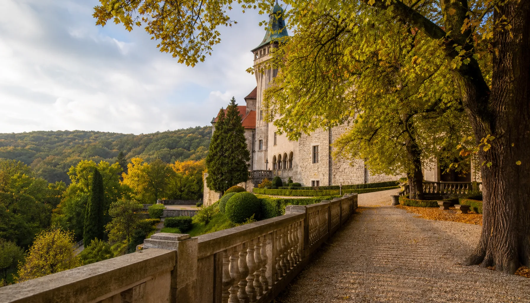 The terraces and park around the château, with the Little Carpathian forest behind