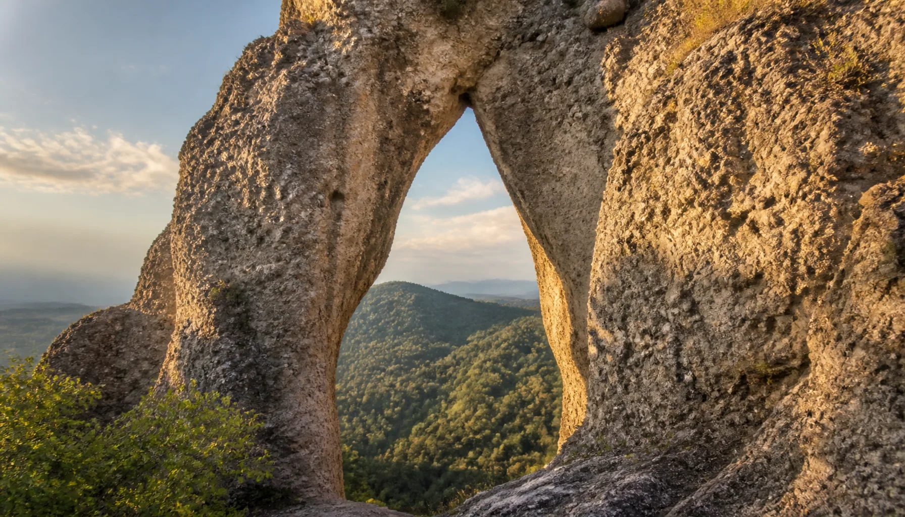 The Gotická brána — the Gothic Gate — a natural conglomerate arch on the circuit
