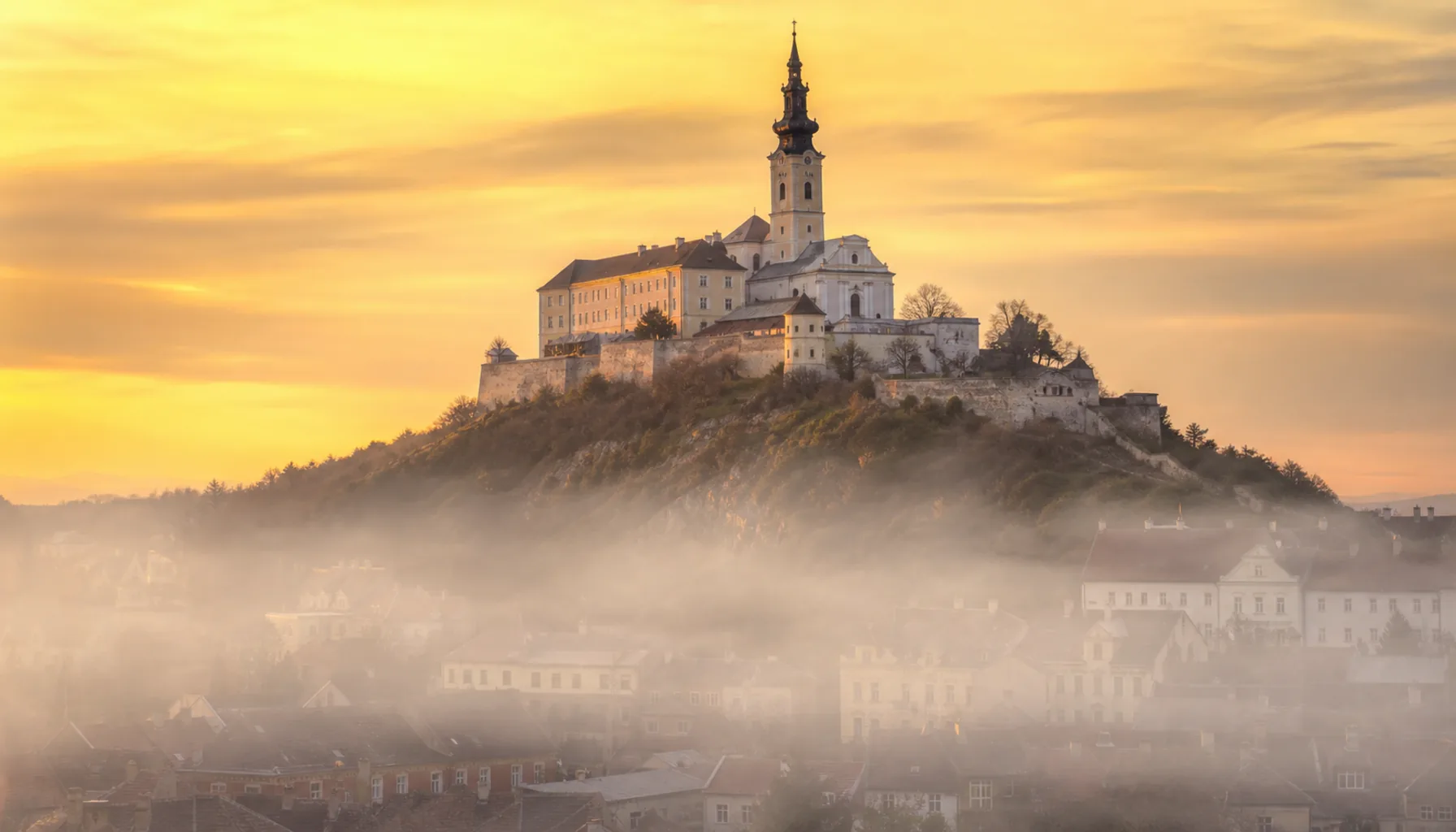 Dawn over Nitra’s castle hill and St Emmeram’s Cathedral — the hill where Slovakia’s written history begins