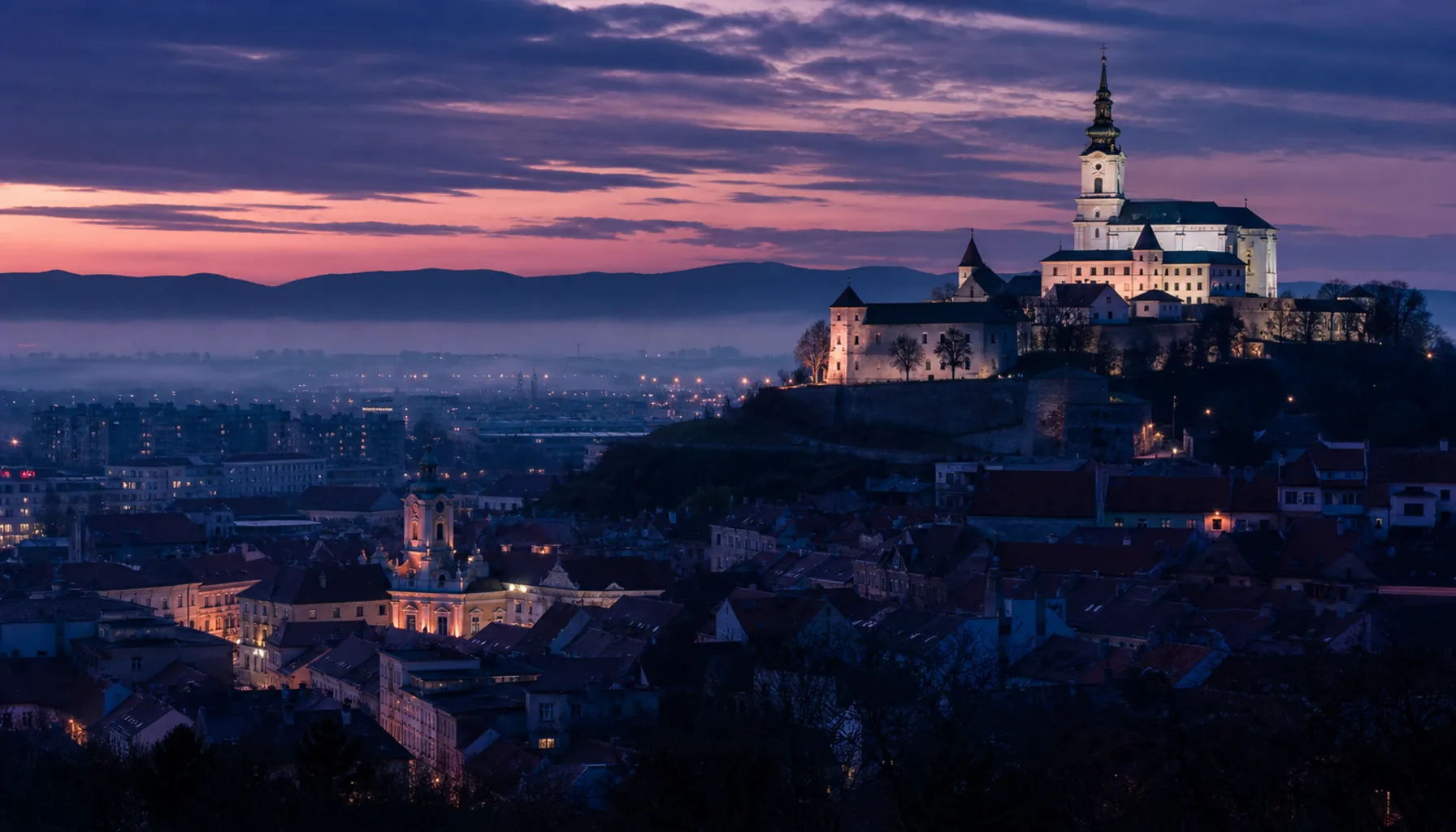 Nitra Castle at dusk — page background