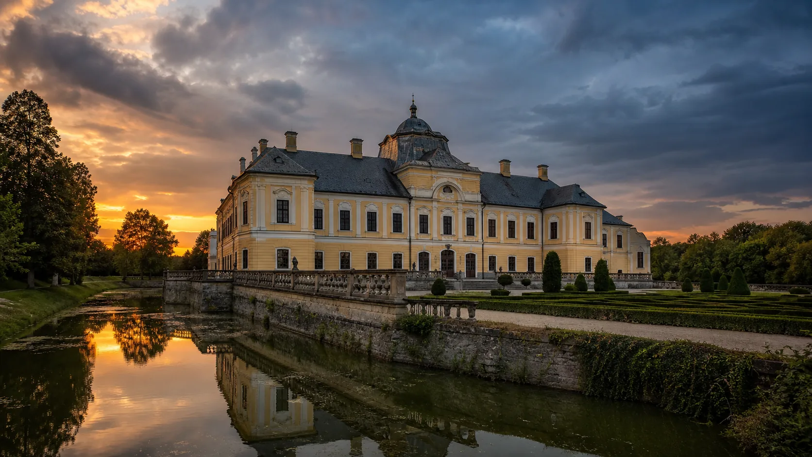 The baroque château of Holíč behind its moat, on the flat land near the Morava