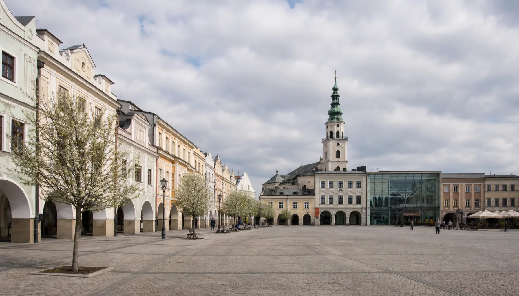 The arcaded main square of Žilina, with a shopping centre entrance set into one frontage