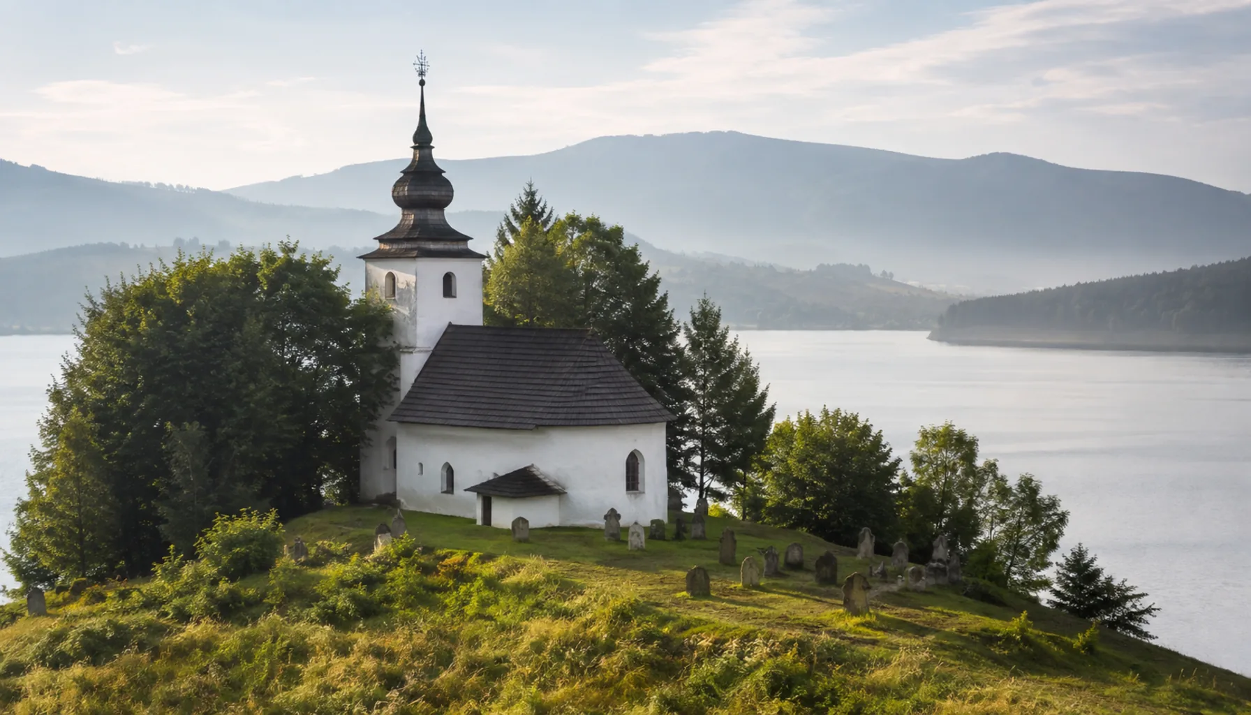 The church of the drowned village of Slanica, left standing on an island when the Orava reservoir filled in 1953