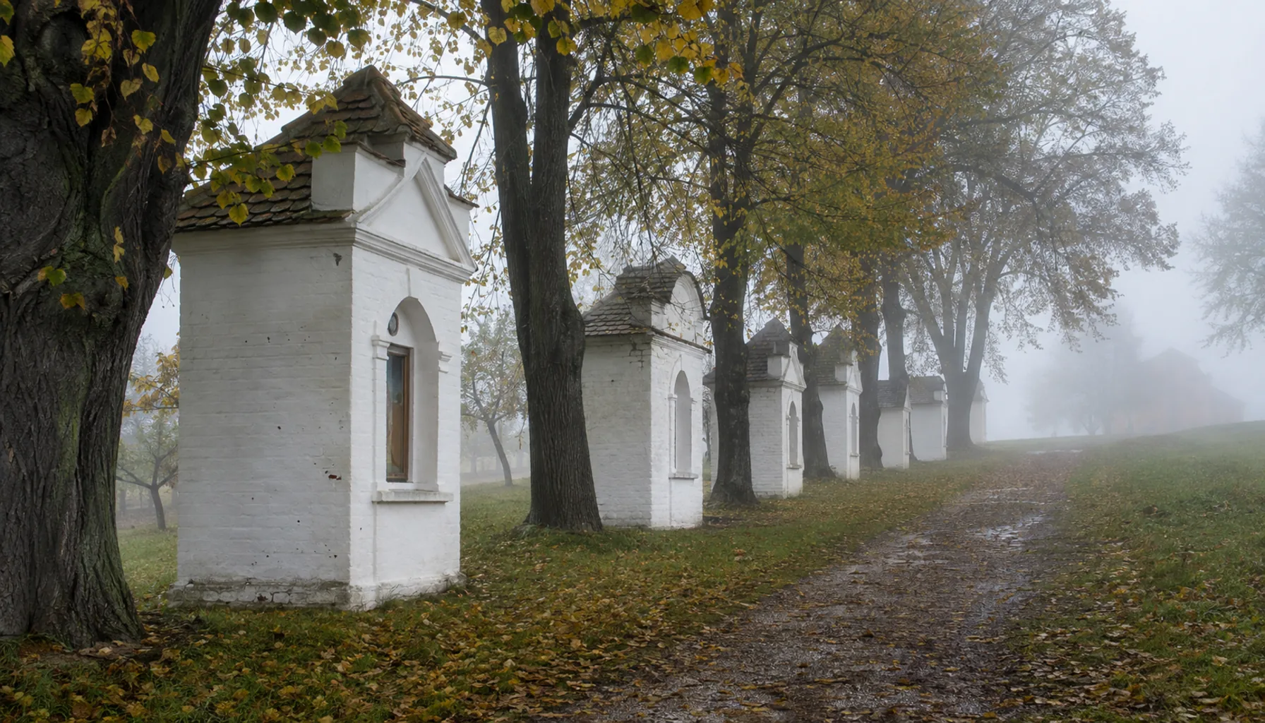 The whitewashed eighteenth-century Calvary chapels on the edge of Nové Zámky on an autumn morning
