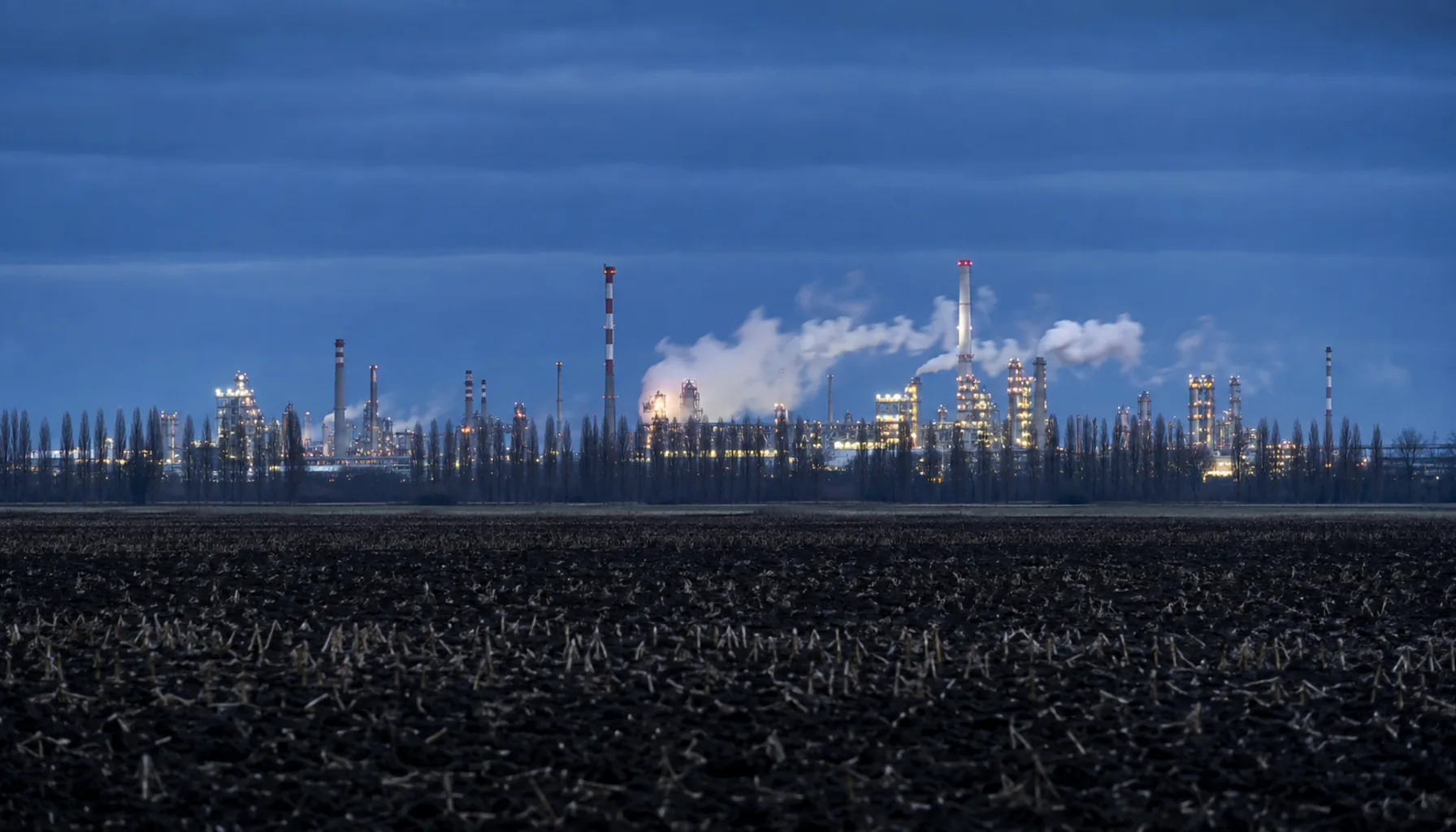 The Duslo chemical works at Šaľa, visible from far out across the flat fields of the lowland