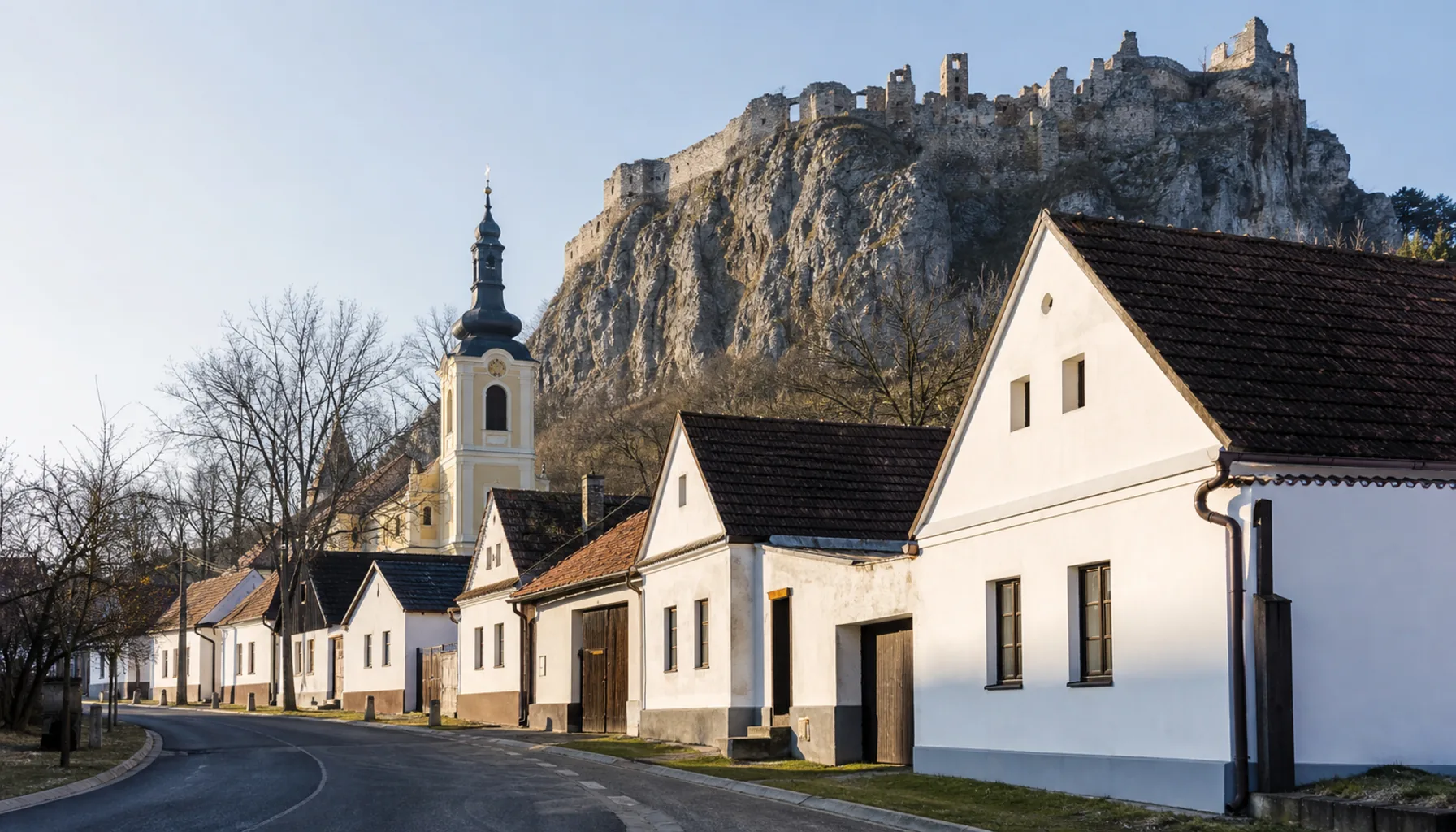 The village street at Beckov under its castle rock
